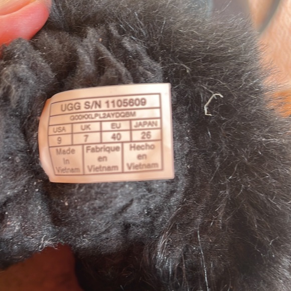 Ugg bootie. Black fluffy top with silver pin. Excellent condition. - Picture 6 of 6